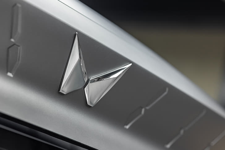 Mahindra Vision X Front Logo Mahindra Vision X Front Logo