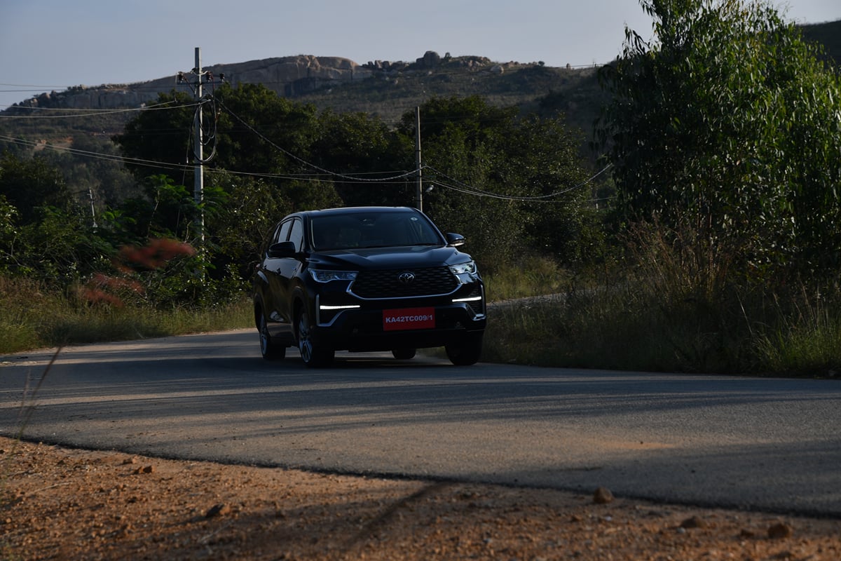 Black Toyota Innova HyCross for chauffeur-driven car rental