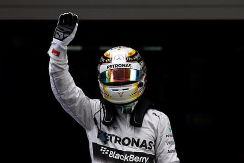 Chinese GP: Hamilton takes pole at damp Shanghai