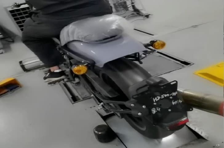 The rear fender is styled similar to a bobber motorcycle.