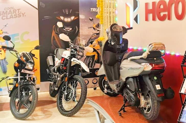 Hero showroom image, December bike sales. Hero Xpulse price, scooter, bike sales December 2023.