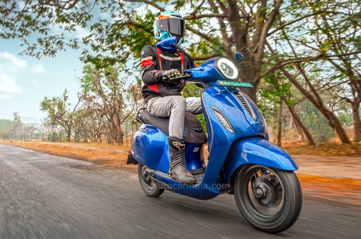 Bajaj Chetak Premium riding shot. 2024 Bajaj Chetak price, features, range: first ride review.