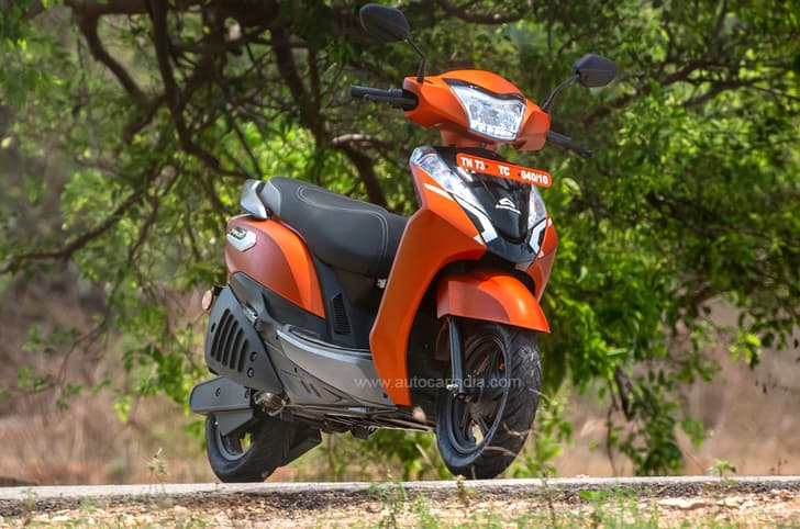 Ampere Primus static image orange colour. Ampere Primus price, Ampere Nexus electric scooter name.