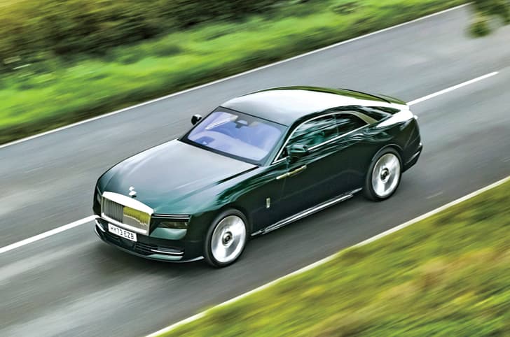 Rolls Royce Spectre on road front left and top Rolls Royce Spectre on road