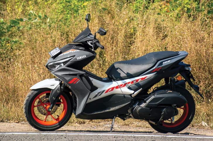 Yamaha Aerox left side profile static in field