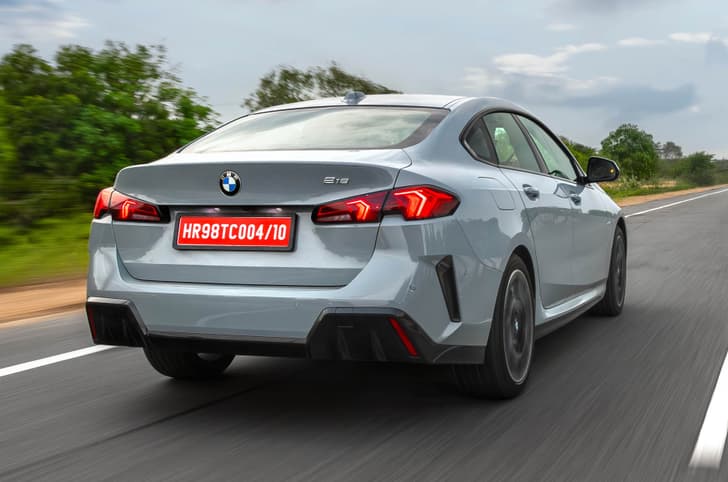 BMW 2 Series rear quarter on highway BMW 2 Series rear quarter on highway