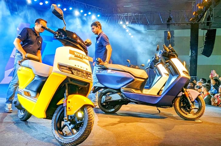 Ather Rizta Z blue and yellow colours front right angle static onstage