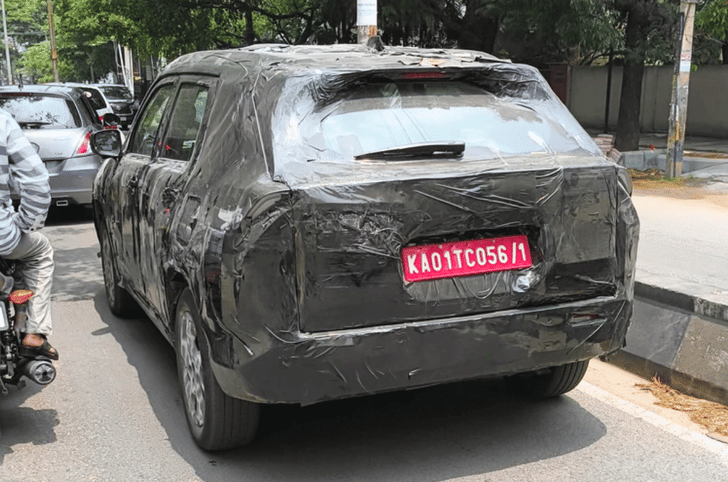 Maruti Escudo Y17 SUV exterior wrapped in camouflage rear