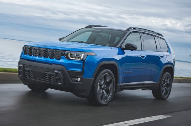 Jeep Cherokee front left side on road Jeep Cherokee front left side on road