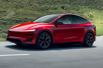 Tesla Model Y front left side on road