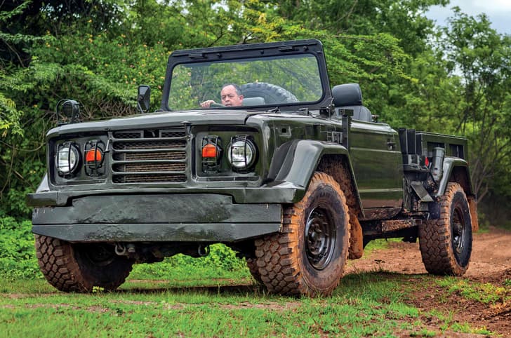 kia km450 army truck in field