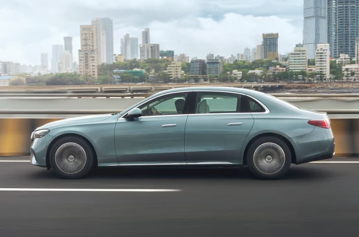 Mercedes Benz E Class E 220d side profile on road Mercedes Benz E Class E 220d side profile on road