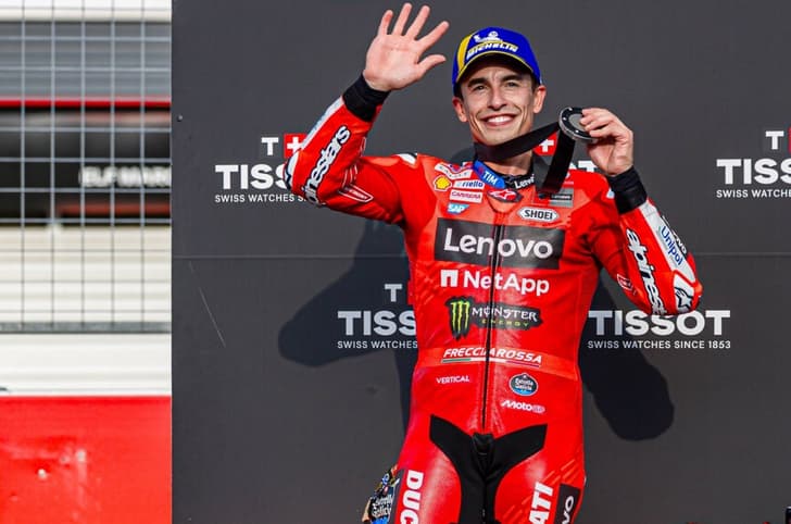 Marc Marquez on podium at Japan