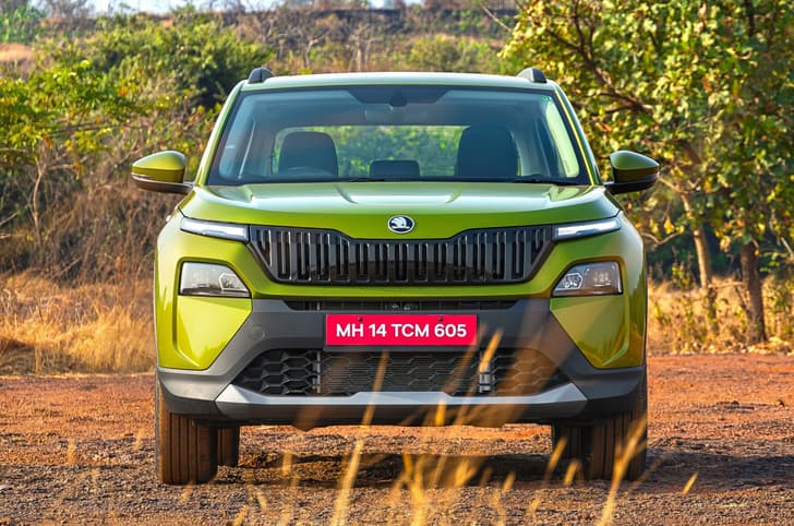 Skoda Kylaq front head on in a field