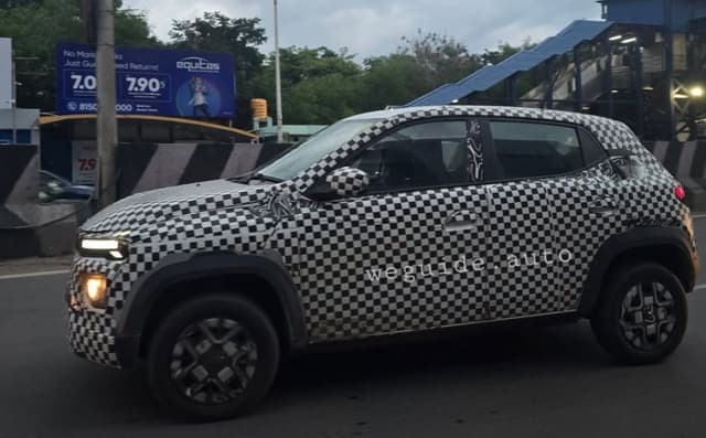 Renault Kwid facelift spied with a larger infotainment screen and Duster like headlights