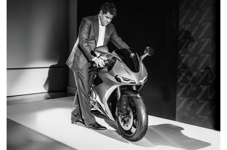 TVS Chairman and MD Sudarshan Venu with new Norton Manx R