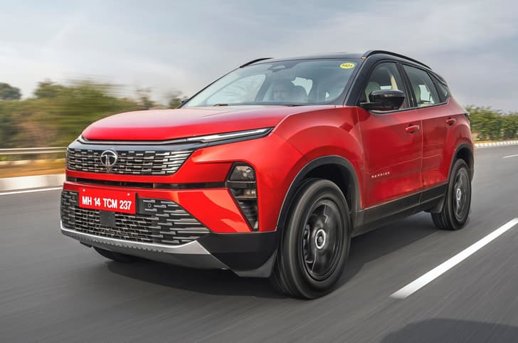 Tata harrier petrol front left side on road driving Tata harrier petrol front left side on road driving