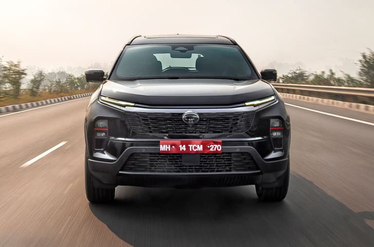Tata Safari petrol front head on road driving Tata Safari petrol front head on road driving