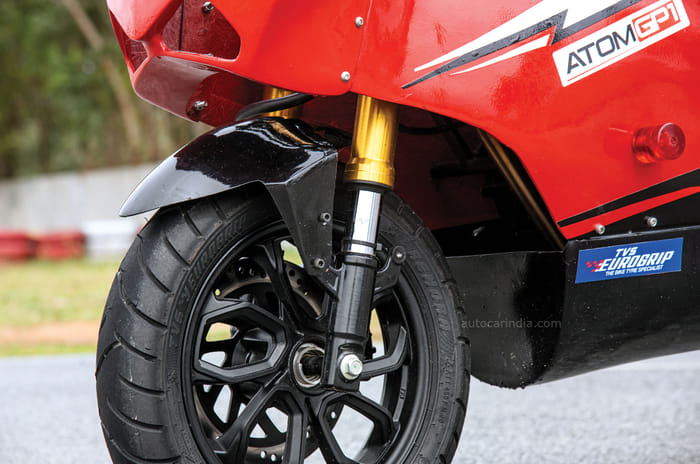 Riding the Atom GP1 minibike on track