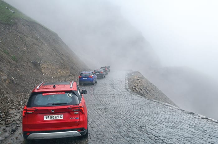 Mahindra SUVs to Kargil convoy on cliffside