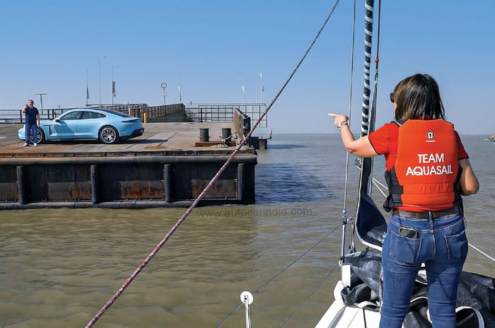 Green light, go: Porsche Taycan vs sailboat 