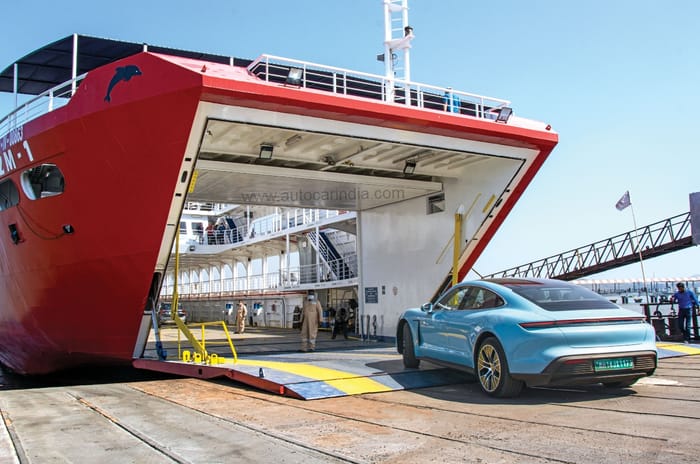 Green light, go: Porsche Taycan vs sailboat 