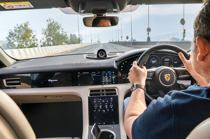 Green light, go: Porsche Taycan vs sailboat 