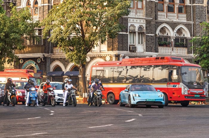 Green light, go: Porsche Taycan vs sailboat 