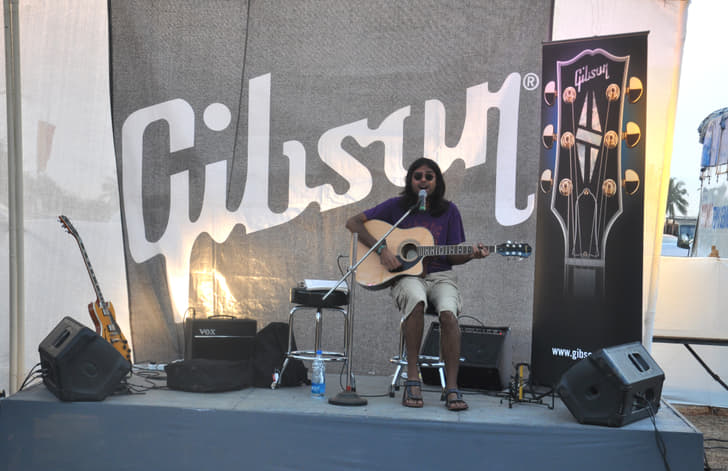 The Gibson stall. Anyone could pick up a guitar and strum away.