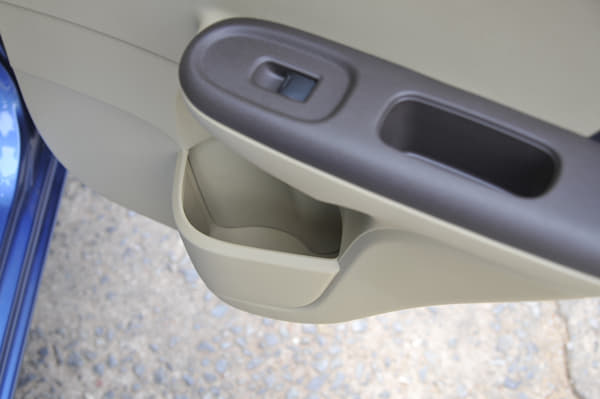 Speakers have been moved to the rear parcel tray from the rear door. 