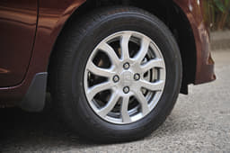 Amaze petrol gets a different alloy-wheel design. 