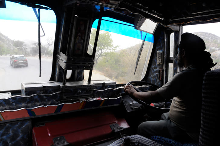 Friendly truck driver let our photographer ride with him in the truck.