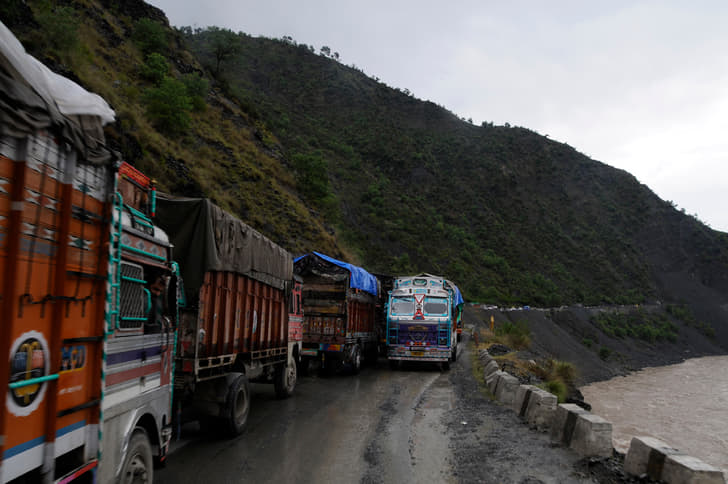 Truck drivers spent the night waiting for the landslide debris to be cleared.
