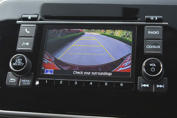 The 8-speaker sound system with with USB, aux-in inputs and a CD player along with screen that doubles up as a reverse camera display.