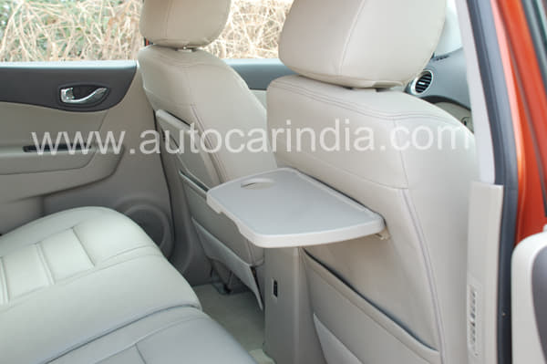 Flip-up tables are a thoughtful touch; but not hugely effective on the move.