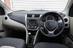 Maruti Suzuki Celerio Dashboard looks upmarket, steering wheel shared with higher Maruti models like the swift. 