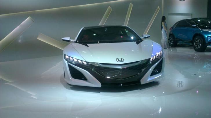 The NSX supercar concept gets a mid-mounted V6 coupled to a pair of electric motors.