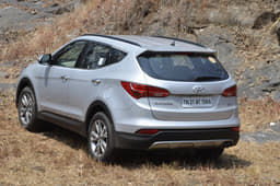 Window line curves upwards towards the rear, giving it a coupé-like appearance.