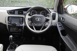 The smart-looking dashboard uses a beige-themed dual-tone colour scheme.