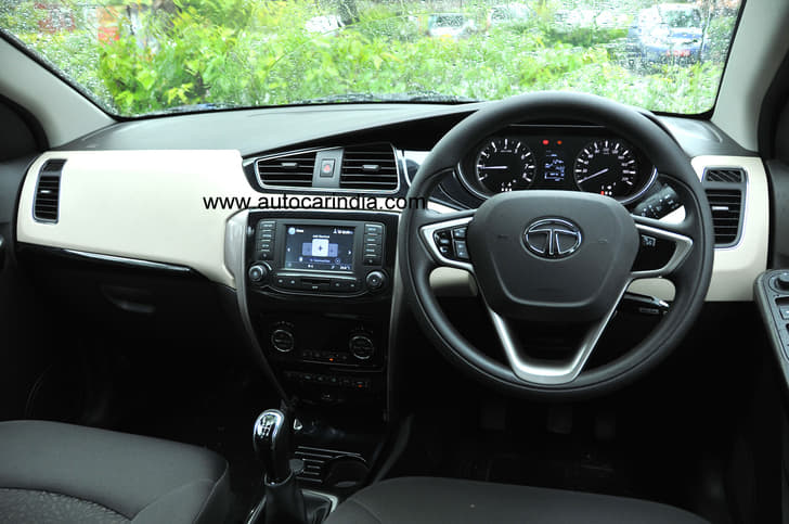 The dashboard gets a dual-tone theme. The steering wheel is a bit smaller than before.