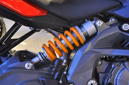 Yellow rear monoshock system is side mounted. 