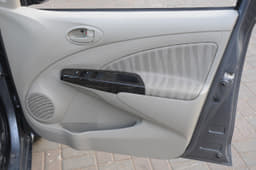 Higher variants get the faux wood trim on inside door handles. 