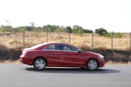 The sides are full of curvy creases and they converge in a compact rear with a pair of neat LED tail-lamps. 