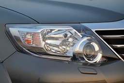 Smoked-headlamp and tail-lamp inserts exclusive to this trim. 