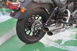 Twin rear suspension with is disc brake makes way here mounted on a box section swingarm. 