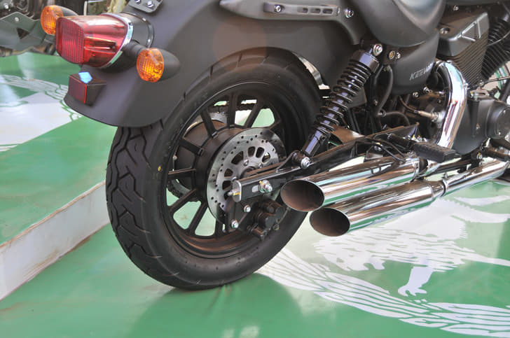 Twin rear suspension with is disc brake makes way here mounted on a box section swingarm. 