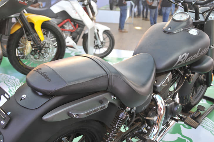 The Blackster gets a single saddle with their logo stitched on the rear seat, and grabhandles that go well with the bike. 