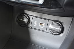 There are two 12V charging sockets on the centre console with aux and USB ports in between.