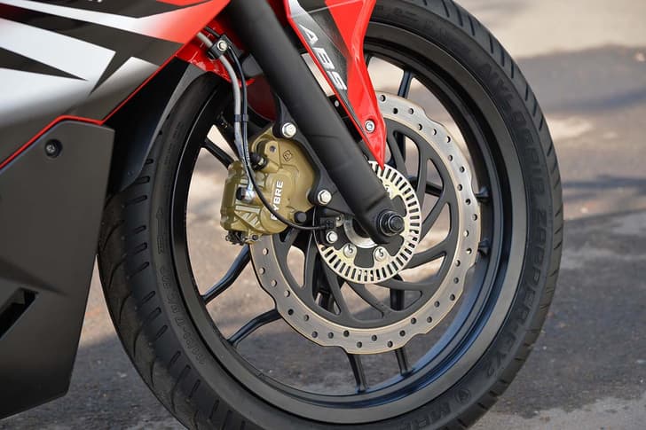 Petal type single rotor 300mm disc brake in front. 