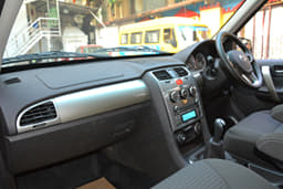The dashboard now features an all-black theme with silver inserts. The centre console retains the circular AC switches on the top but now comes with a silver finish. A touchscreen infotainment system is still not on offer. 
